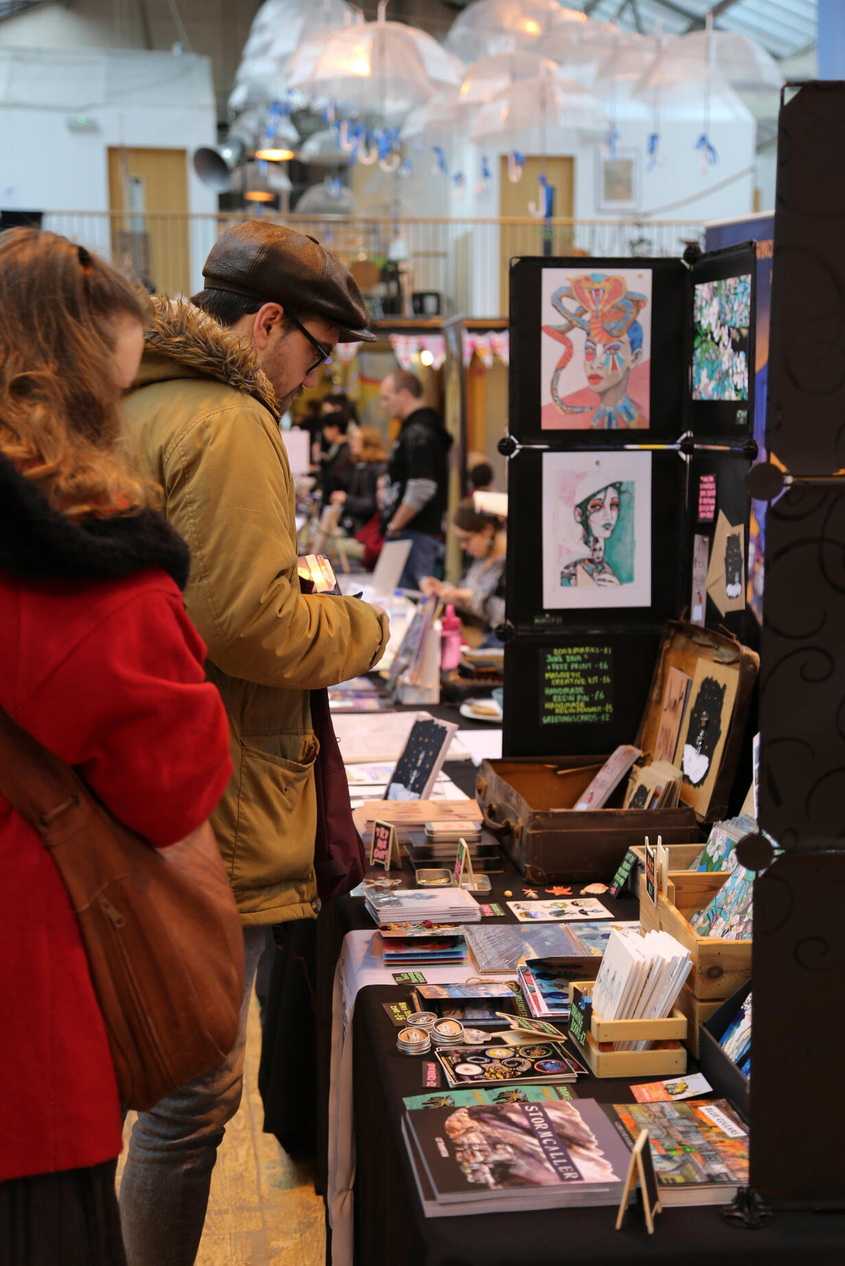 Close up photo of more visitors and vendors in winter clothing. Close up photo of more visitors and vendors in winter clothing.