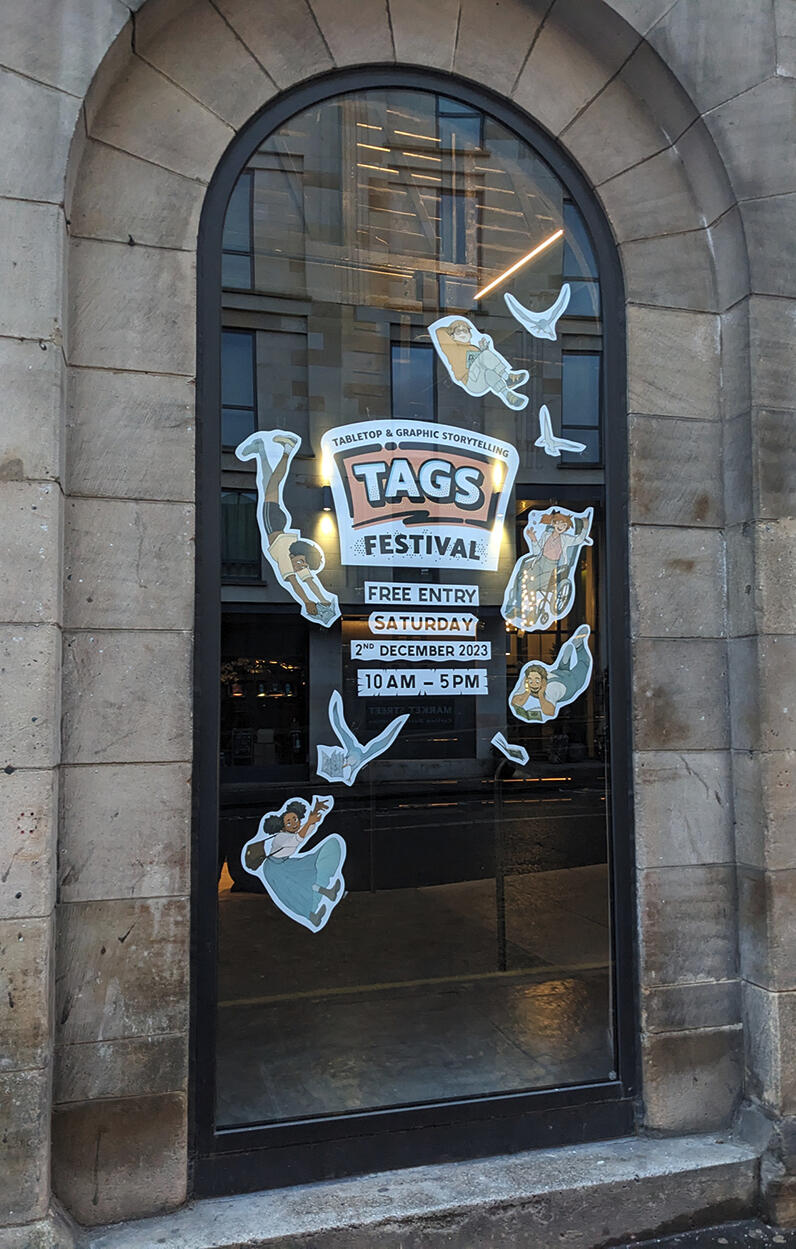 Photo of a window display for TAGS 23, designed to draw in passers by.